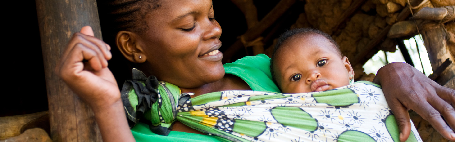 Mother and child in village at Gedi, Malindi Kenya