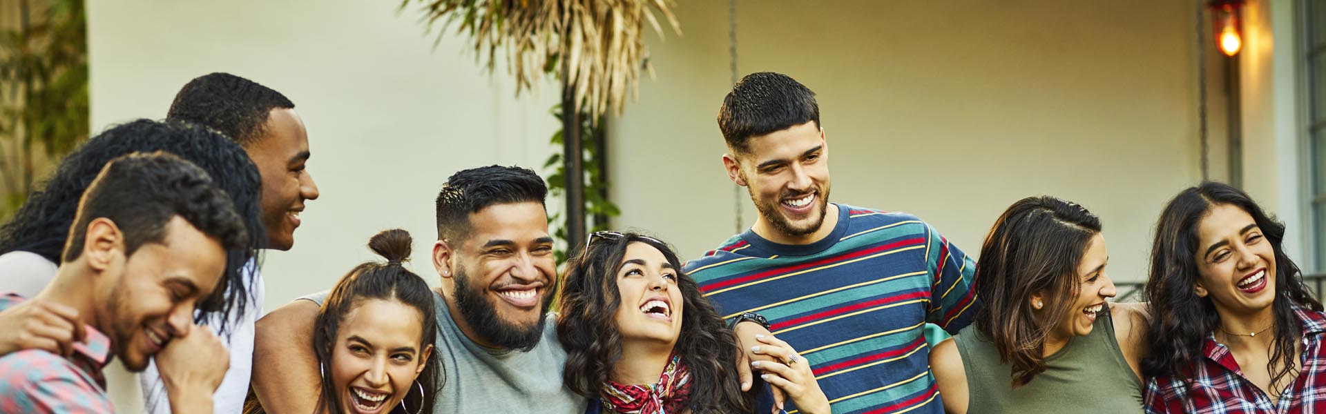 Cheerful multi-ethnic friends having fun in party