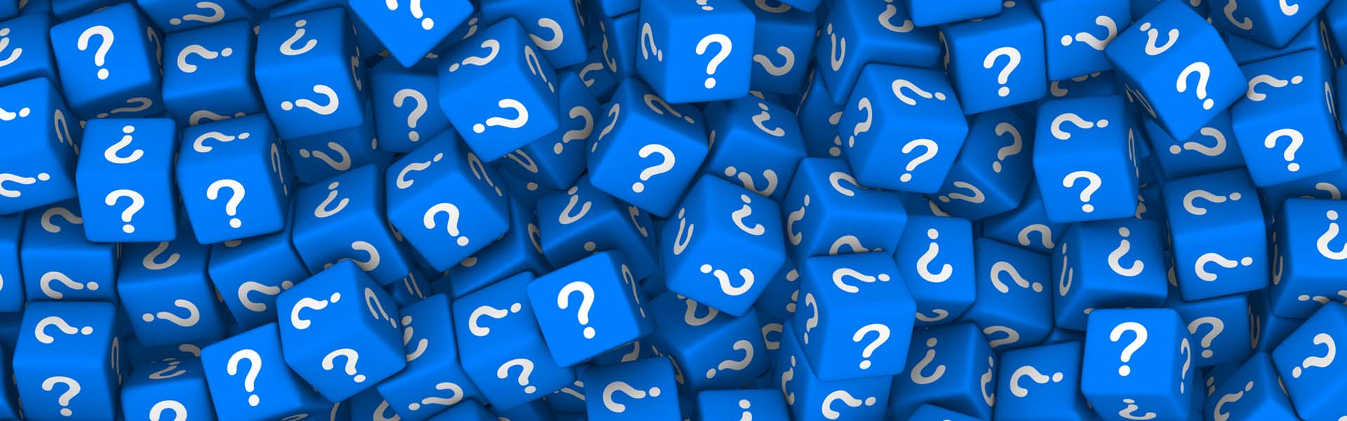 Heap of blue dices with question marks.
