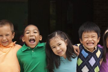 Diverse students standing together in a row