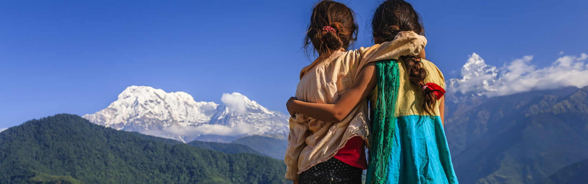 Nepali little girls looking at Annapurna South