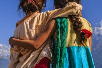 Nepali little girls looking at Annapurna South