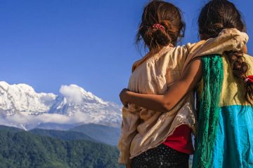 Nepali little girls looking at Annapurna South