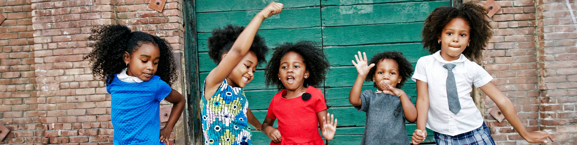 Group-of-young-children-happy-hero