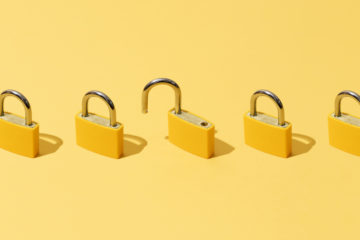 Five Yellow Padlocks On Yellow Background