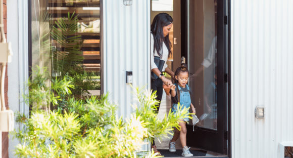 Woman and her daughter leaving home during COVID-19