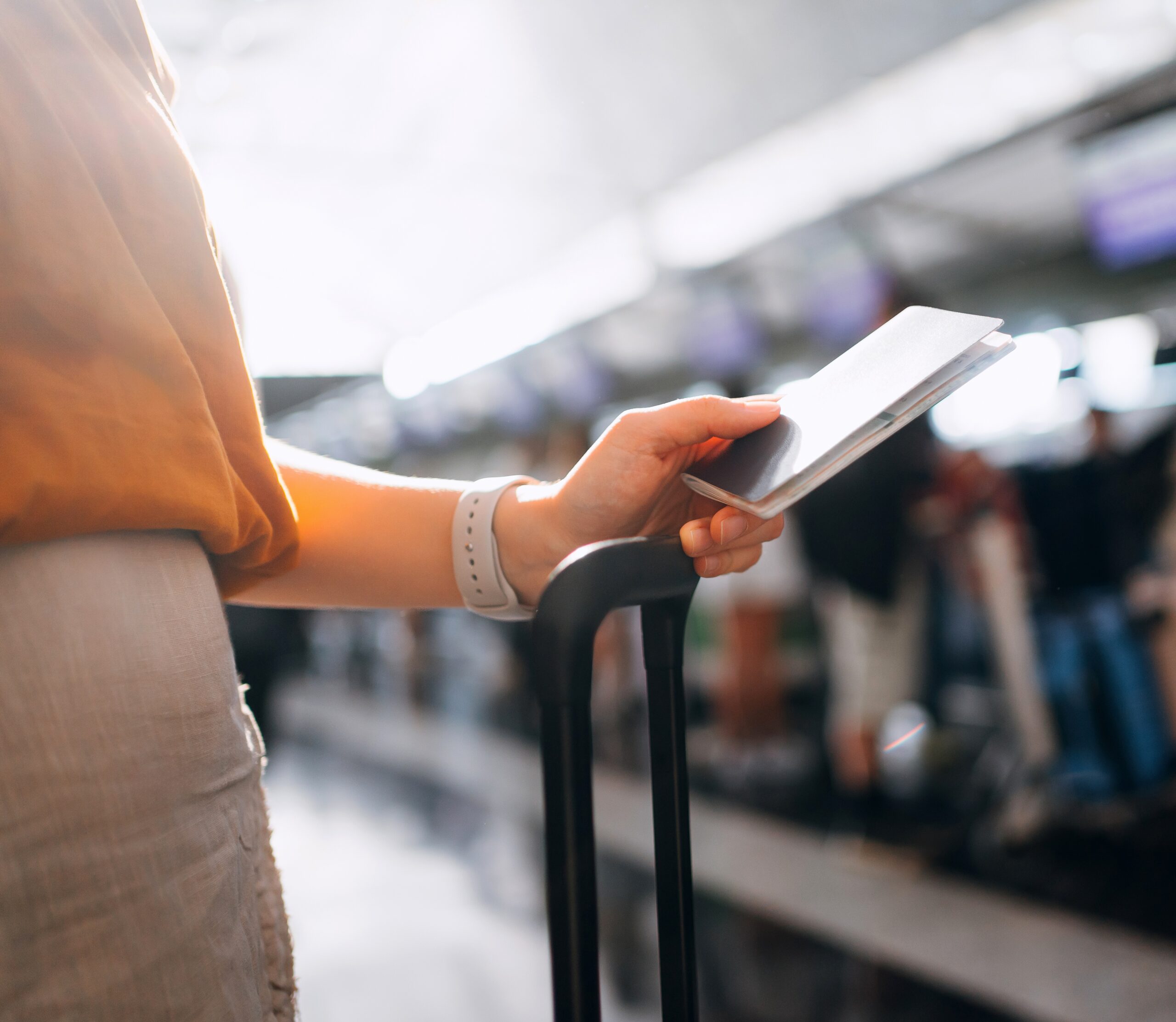 Travelers and migrants moving through an international transit hub